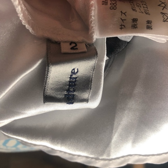 Rirandure Sleeveless Faux Wrap Dress - Picture 14 of 16